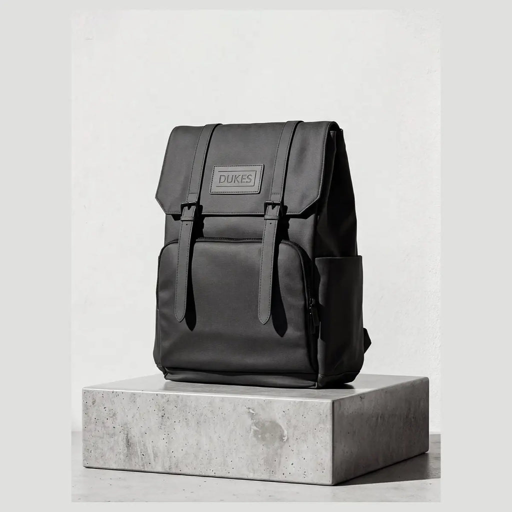 DUKES CITYLINE Backpack, Premium PU Exterior and Polyester Lining, Magnetic Strap Buttons, Zipper and Hasp Closure, Dedicated Computer Interlayer, Fully Waterproof, 32x12x44cm - Pure Black