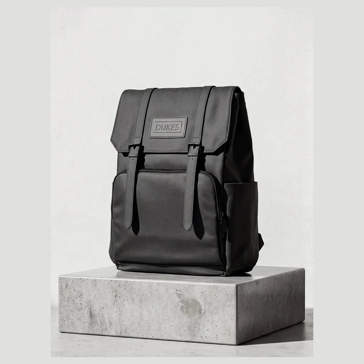 DUKES CITYLINE Backpack, Premium PU Exterior and Polyester Lining, Magnetic Strap Buttons, Zipper and Hasp Closure, Dedicated Computer Interlayer, Fully Waterproof, 32x12x44cm - Pure Black
